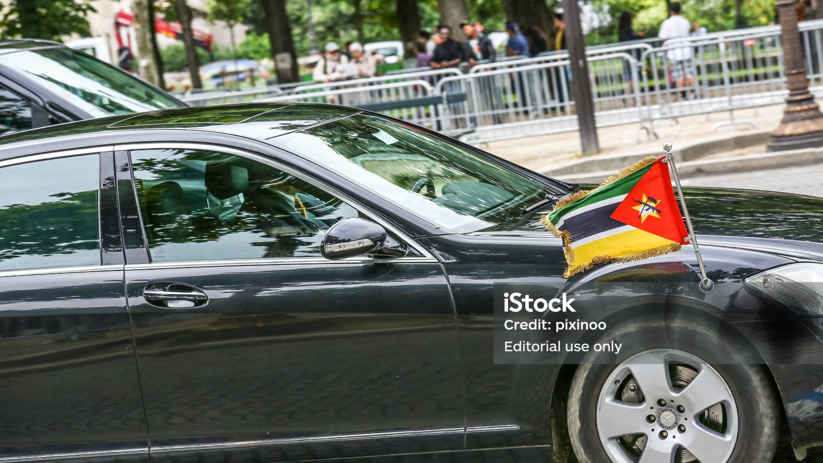 Paris, France -  July 14, 2016 : Mozambique Diplomatic car during Military parade in Republic Day. Champs Elysees.