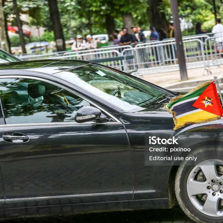 Paris, France -  July 14, 2016 : Mozambique Diplomatic car during Military parade in Republic Day. Champs Elysees.